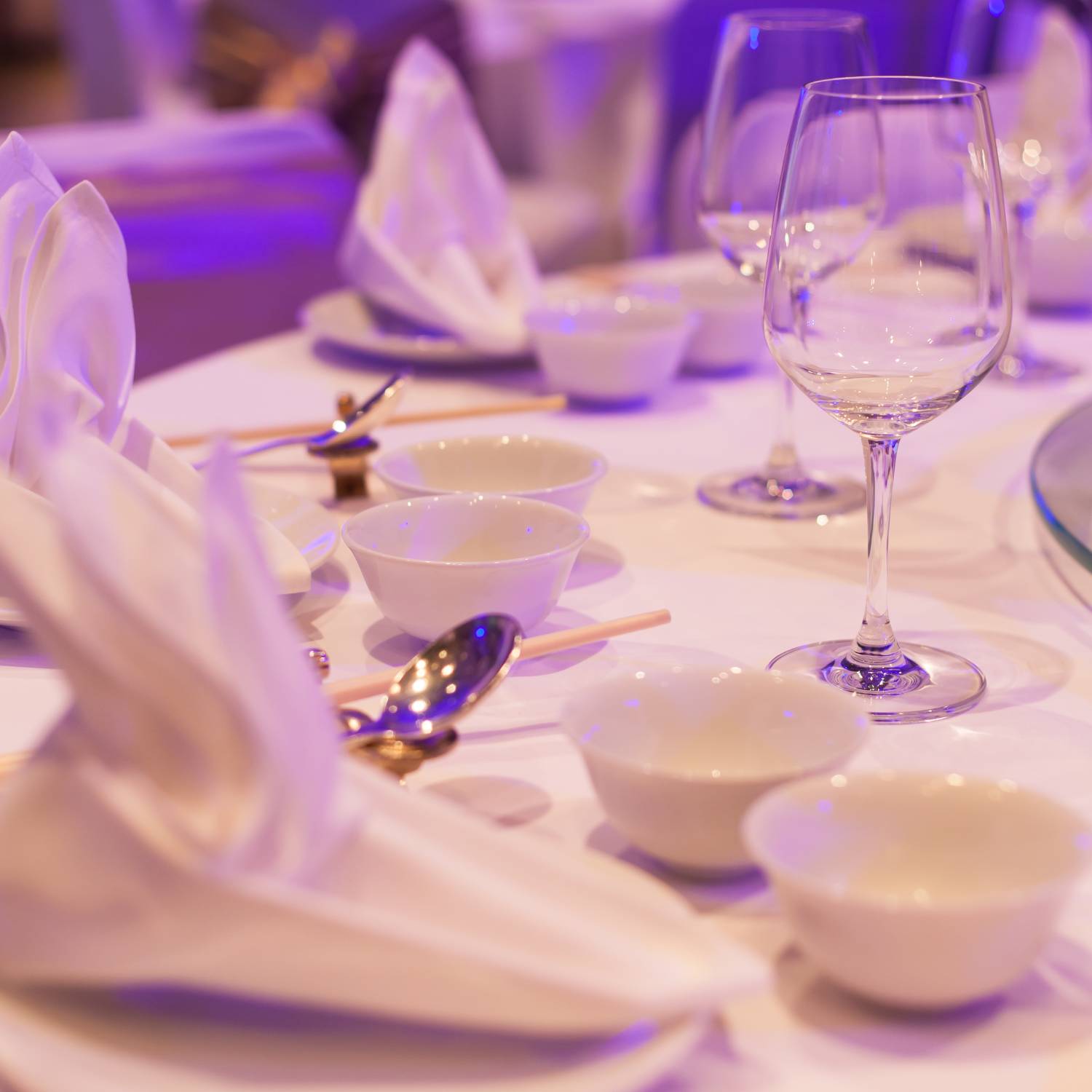 Plates, bowls and flatware on a table